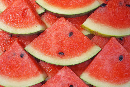 pieces of fresh watermelon as backgroundの写真素材