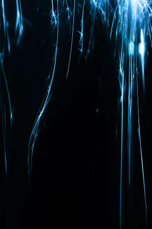 Glowing Blue Sparkle Abstract Backgroundの写真素材
