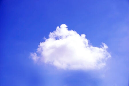white clouds against blue skyの写真素材
