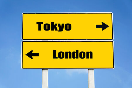 London and Tokyo on road sign boardの写真素材