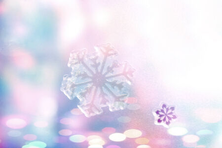 Winter Holiday Snow Background, colorful bokeh.の写真素材