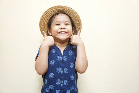 happy pretty girl with thumbs up