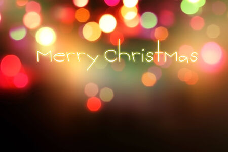 merry christmas written on bokeh backgroundの写真素材