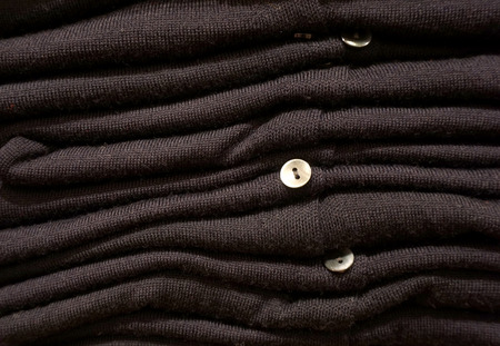 Stack of black clothesの写真素材