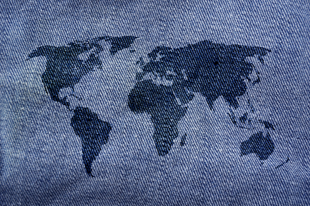 world map on denim jeans backgroundの写真素材