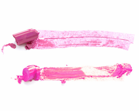 Smudged pink lipstick isolated on white backgroundの写真素材