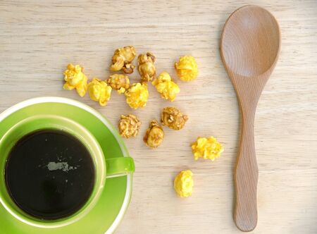 black coffee and popcorns top view.の写真素材
