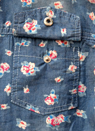 pocket on jeans shirt with flower pattern.の写真素材