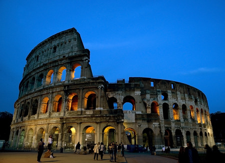ROME - APRIL 18: Coliseum exterior on April 18, 2015 in Rome, Italy. The Coliseum is one of Rome's most popular tourist attractions with over 5 million visitors per year.のeditorial素材