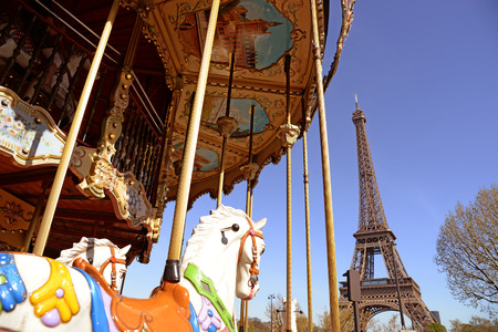 View of the carousel and the Eiffel Towerの写真素材
