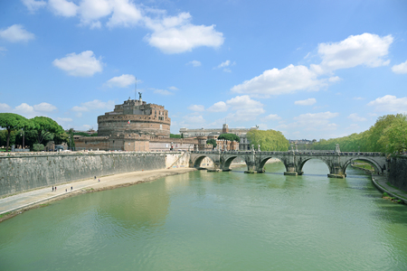 View on famous Saint Angel castle and bridge over the Tiber river in Rome, Italy.のeditorial素材