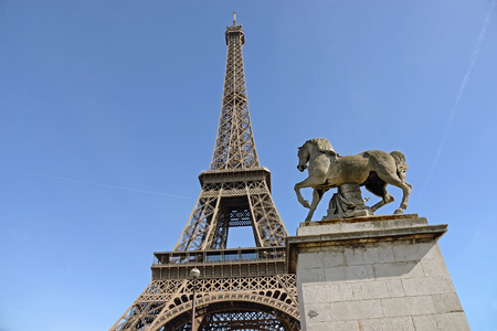 Eiffel Tower and Horse Sculpture in Foreground, Paris, Franceの写真素材
