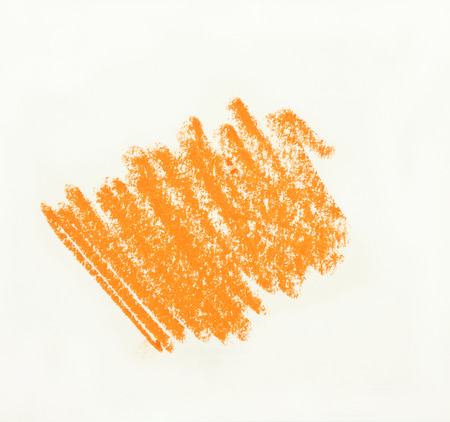 yellow wax pastel crayon spot isolated on white backgroundの写真素材