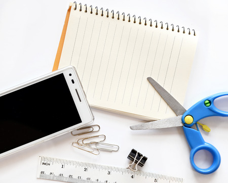 Top view. Business and office supplies with modern digital phone