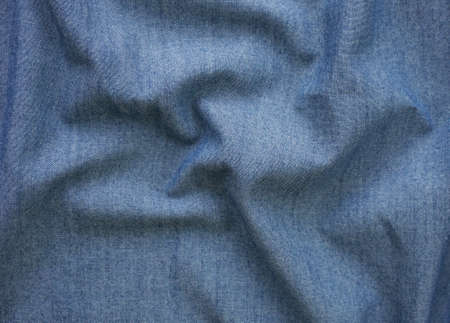 Closeup detail of blue jean fabric texture backgroundの写真素材