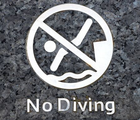 no diving warning at swimming poolの写真素材