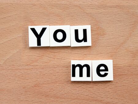 You and me, word concept on wooden backgroundの写真素材