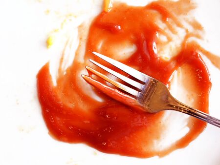 tomato sauce with fork on plate