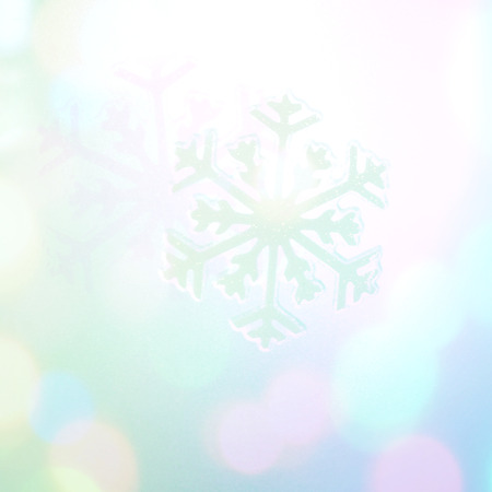 Winter holiday snow flake blue background, bokeh.