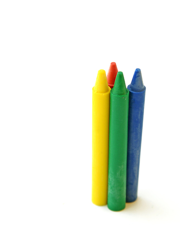 wax crayons standing on white backgroundの写真素材