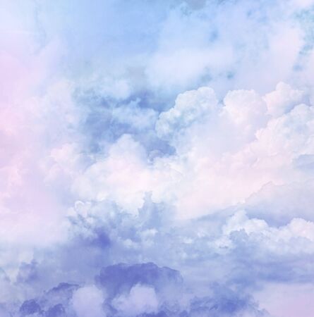 Vintage background in the blue shade with cloudsの写真素材