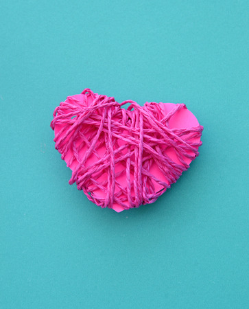 Pink clew in shape of heart (love concept)の写真素材