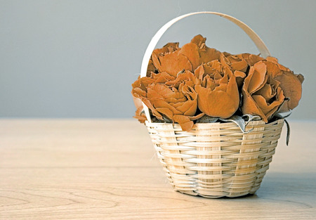 dried roses in basket gift (love concept)の写真素材
