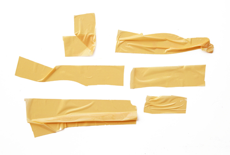 collection of various adhesive tape pieces on white backgroundの写真素材
