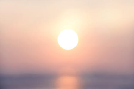 Blurred abstract background last light evening with sunset golden rush hour, pastel tone.の写真素材