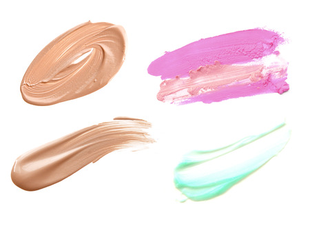 Sample of liquid foundation and lip isolate on whiteの写真素材