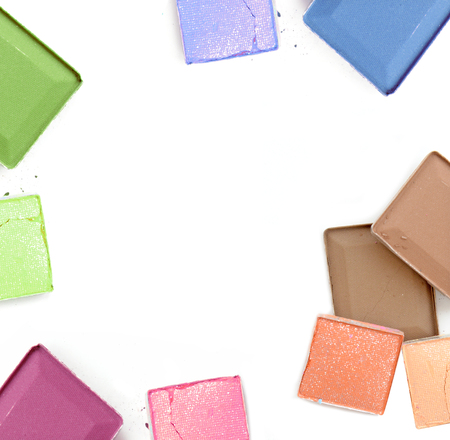 Colorful Decorative cosmetics on white concrete floor workplace. Top view for frame background.の写真素材
