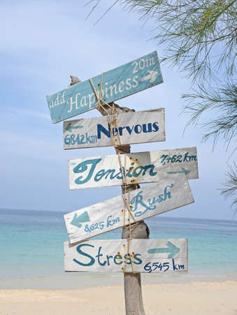 Wooden sign post on the island on summer dayの写真素材