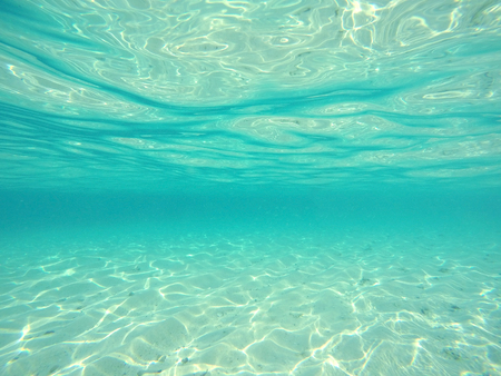 underwater background with sandy sea bottomの写真素材