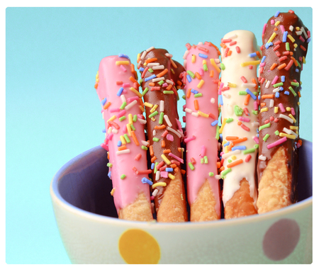 crispy sweet straws filled chocolate close up.