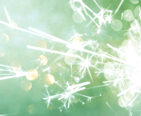 Green silver and white abstract bokeh lights. defocused background. Holiday background.