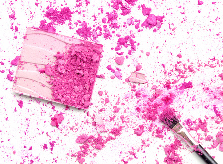 crushed eyeshadows with box and make up brush as a backgroundの写真素材