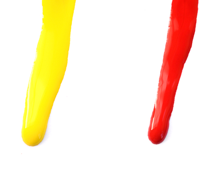 close up of paint leaking on white backgroundの写真素材