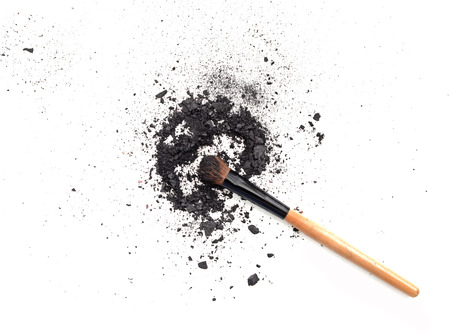 Black make up color. Make up eyeshadow with brush. Isolate on white.の写真素材