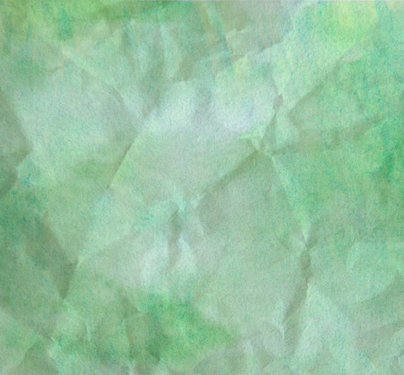 green watercolor paper, wrinkle texture backgroundの写真素材