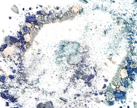Crushed makeup on white background. The eye shadows.の写真素材