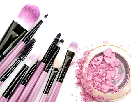 Cosmetic powder brush circle box and crushed blush palette isolated on whiteの写真素材