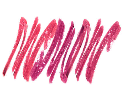 Collection of smudged lipsticks isolated on whiteの写真素材