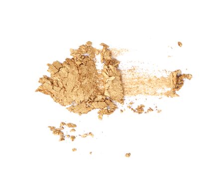Golden glitter eyeshadow isolate on white.の写真素材