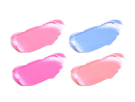 Collection of smudged lipsticks isolated on whiteの写真素材