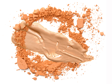 Beige foundation make up with crushed powder isolateの写真素材
