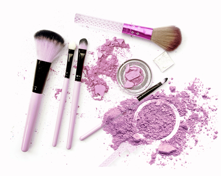 Crushed facial purple eyeshadow on white backgroundの写真素材