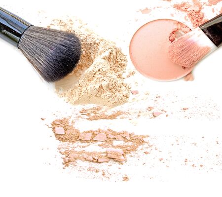 Face powder and brush on white backgroundの写真素材