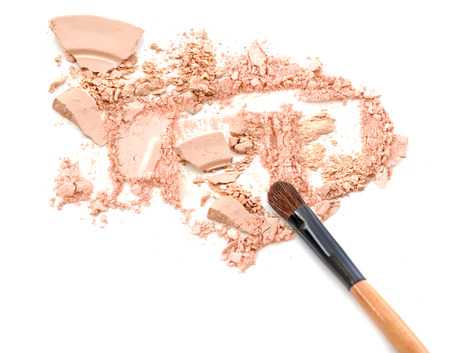 Blush make up and powder crushed on white.の写真素材