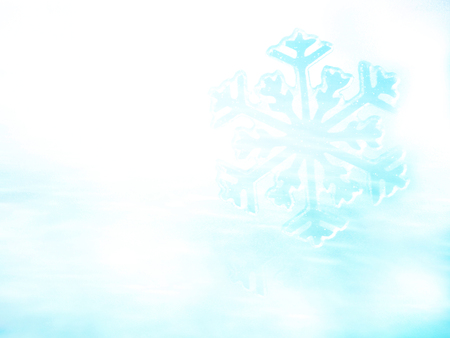 Snowflake on snow.Winter holidays background.の写真素材
