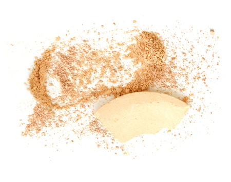 Make up cosmetic powder. Broken on white.の写真素材